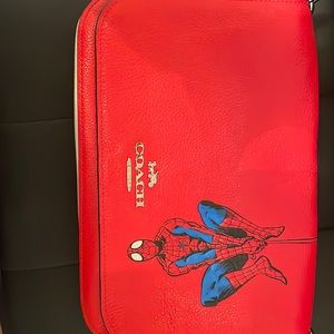 Red and white coach purse